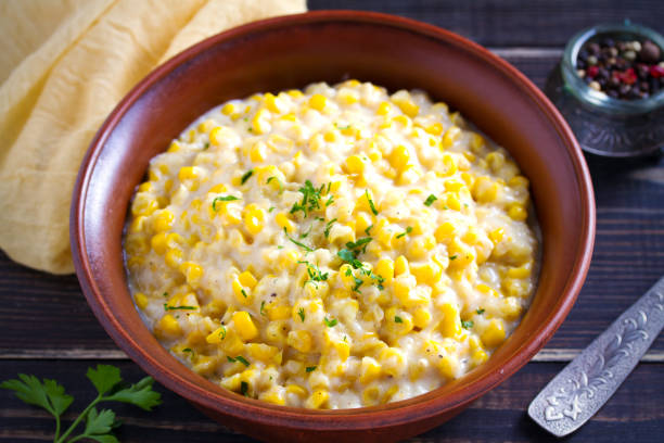 istock Sweet and creamy corn in bowl. Homemade corn dish 1075985566