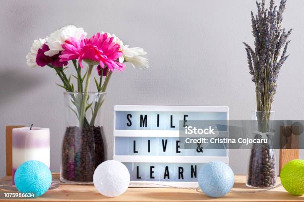 Flowers And Home Decorations Set Up With Inspirational Message 7 Stock Photo - Download Image Now