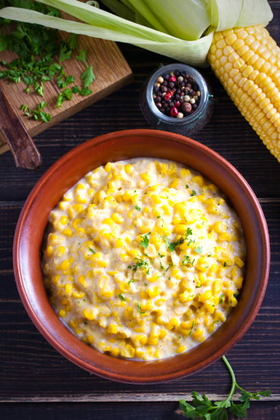 istock Sweet and creamy corn in bowl. Homemade corn dish 1075986964