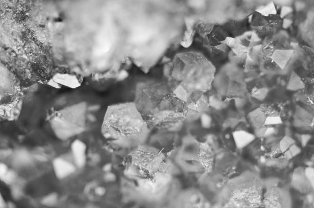 istock Black and white background of the crystals surface. Macro closeup. 1075991002