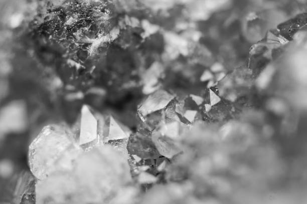 istock Black and white background of the crystals surface. Macro closeup. 1075992724