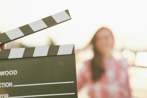 istock Man hands holding movie clapper 1075994050