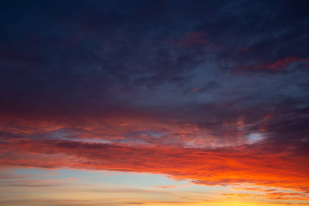 istock Red sunset with clouds in autumn season 1075996928