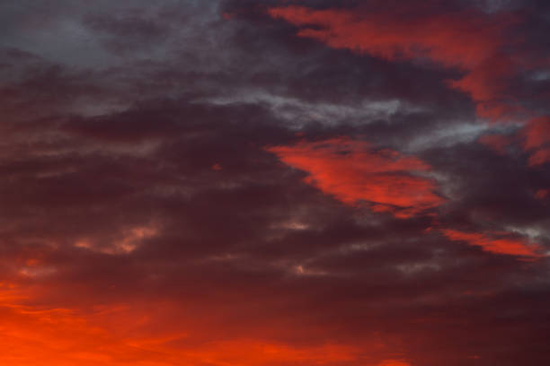 istock Red sunset with clouds in autumn season 1075997094