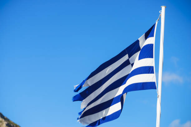 istock Greek flag waving o wind. 1075997578