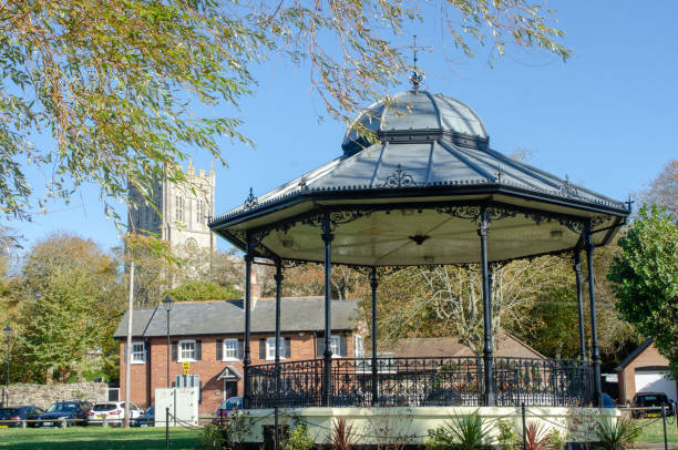 Bandstand with Priory  in Background Christchuch Dorset UK Christchurch  Dorset UK - 21 October 2018: Bandstand with Priory  in Background Christchuch Dorset UK christchurch england photos stock pictures, royalty-free photos & images