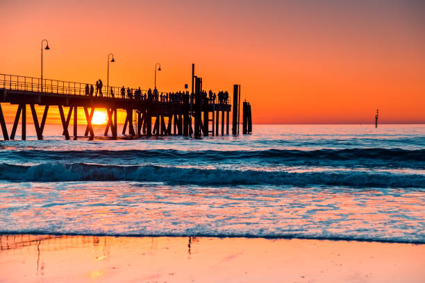 istock Iconic Glenelg Beach with blurred jetty at sunset 1076008102