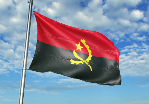 istock Angola flag waving cloudy sky background realistic 3d illustration 1076015990