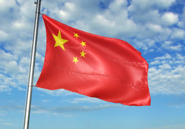 istock China flag waving cloudy sky background realistic 3d illustration 1076016328