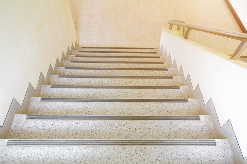 stairs terrazzo floor walkway up - down. interior building. select focus with shallow depth of field
