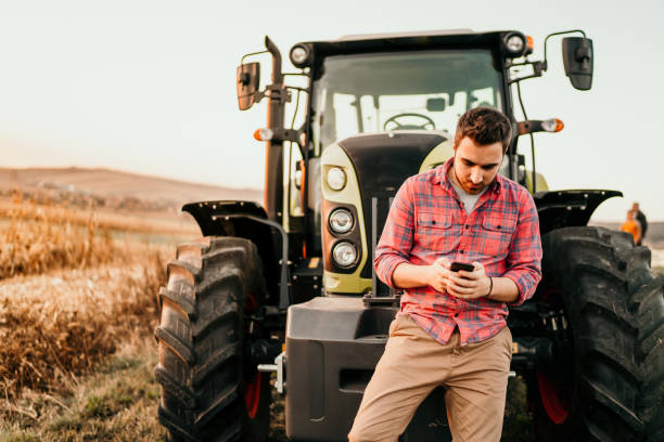 istock Modern agriculture with technology and machinery concept 1076028874