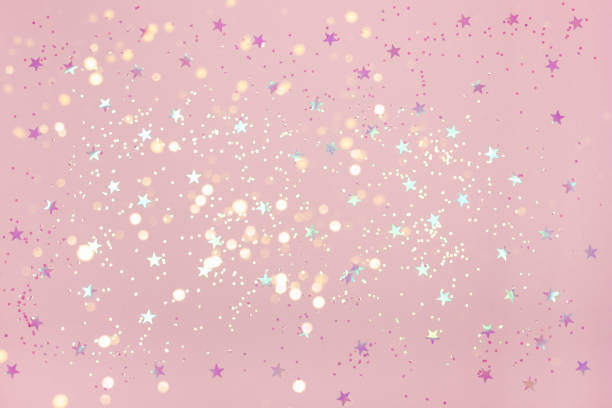 istock Pink Christmas background with confetti. 1076031168