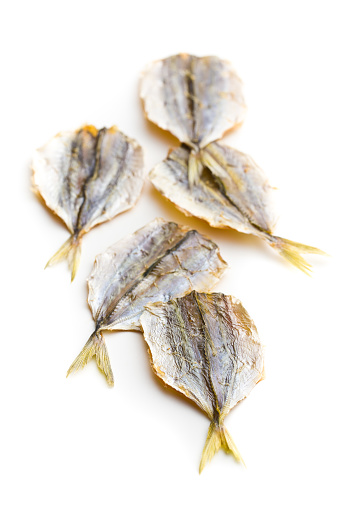 Dried salted fish isolated on white background.