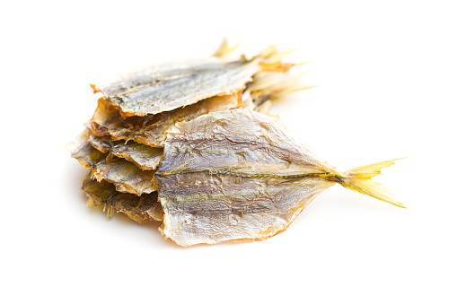 Dried salted fish isolated on white background.
