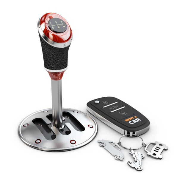 istock 3d illustration of gear shift with car key, isolated on white 1076048794