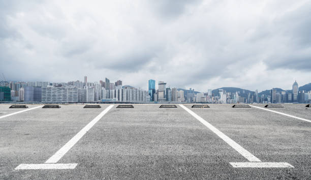 istock Panoramic skyline and buildings with empty road in Hong Kong 1076050722