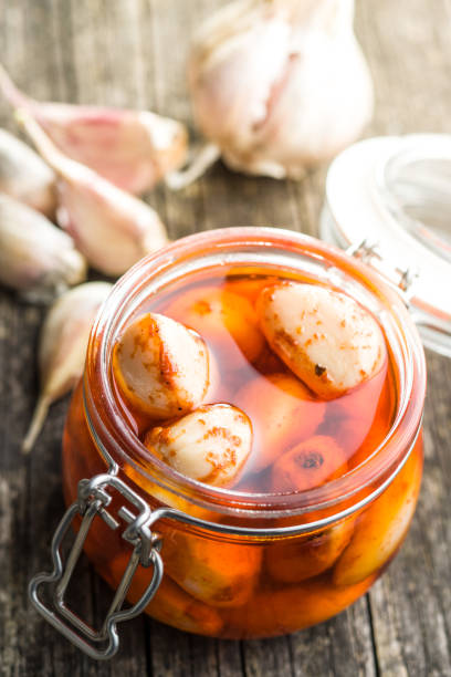 istock Tasty preserved garlic 1076053058