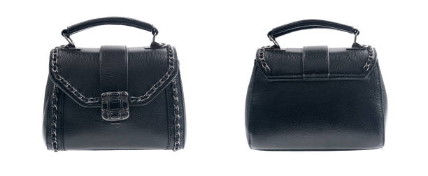 Black female handbag  isolated on white background.Side view.