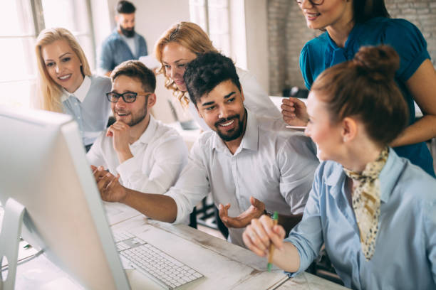 istock Business, technology and people concept - creative team or designers working in office 1076058160