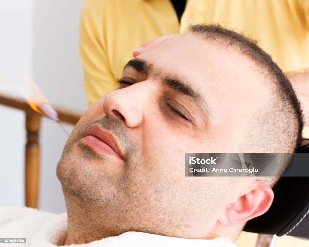 Turkish Barber Ear Hair Removal By Burning Fire Stock Photo - Download  Image Now - Adult, Adults Only, Barber - iStock