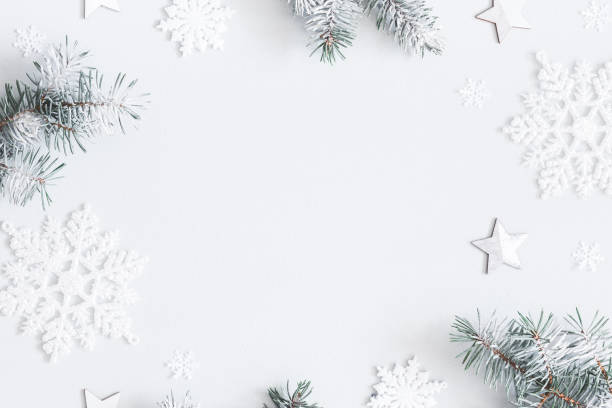 istock Christmas composition. Frame made of fir tree branches, decorations on pastel gray background. Christmas, winter, new year concept. Flat lay, top view, copy space 1076060196