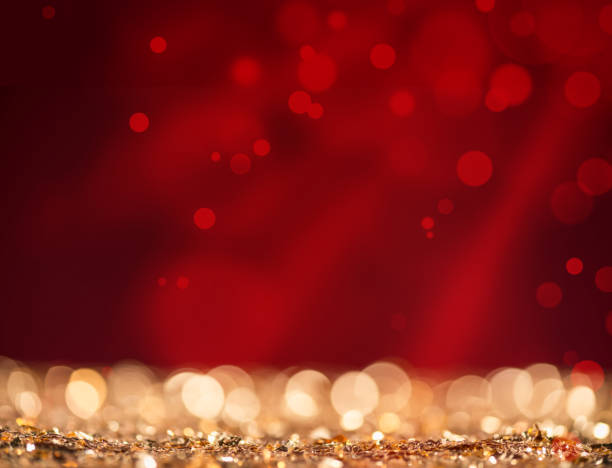 istock Defocused red lights and gold sparkles 1076072652