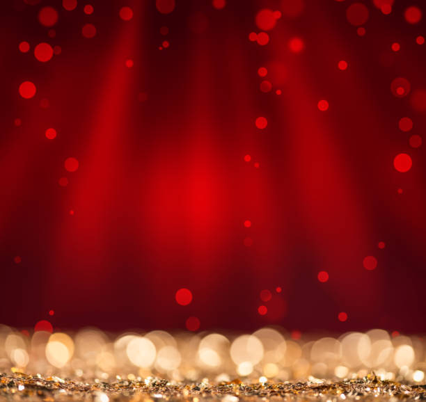 istock Defocused red lights and gold sparkles 1076072684