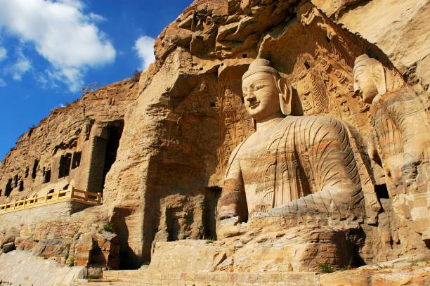 Buddha of Yungang buddhist caves in Shanxi, China. stock photo