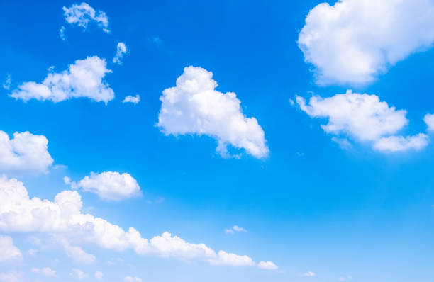 istock Beautiful white clouds with blue sky.Color shade gradient from white to blue using for fresh background wallpaper. 1076074524