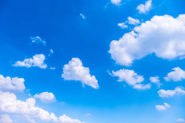 istock Beautiful white clouds with blue sky.Color shade gradient from white to blue using for fresh background wallpaper. 1076076392