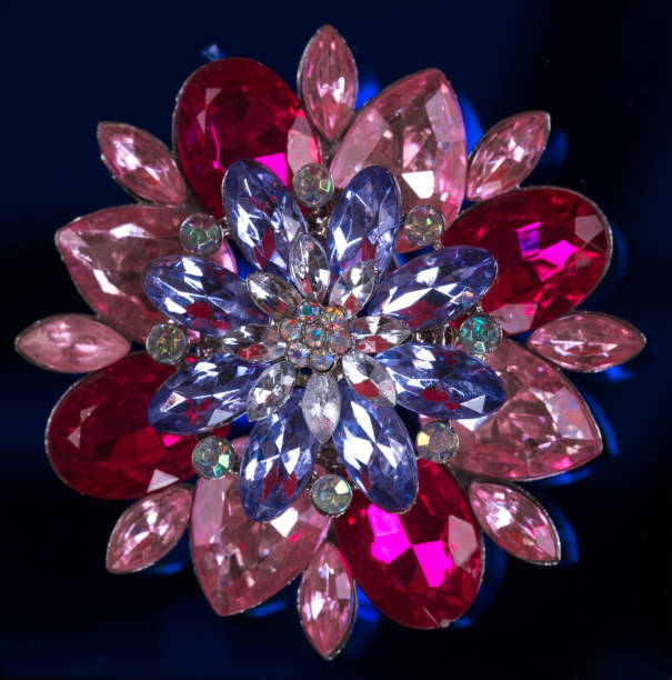 istock brooch with gems on a black background 1076078592