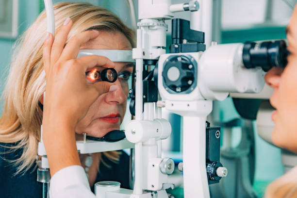 Eye Exam. Ophthalmologist Using Slit Lamp