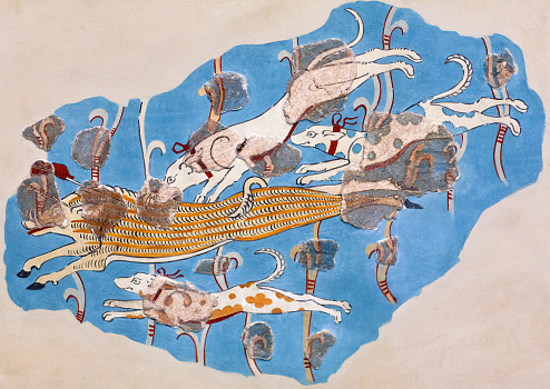Argolis, Greece - March 16, 2018: Mycenaean fresco wall painting of a Wild Boar Hunt from the Tiryns palace. 14th - 13th Century BC