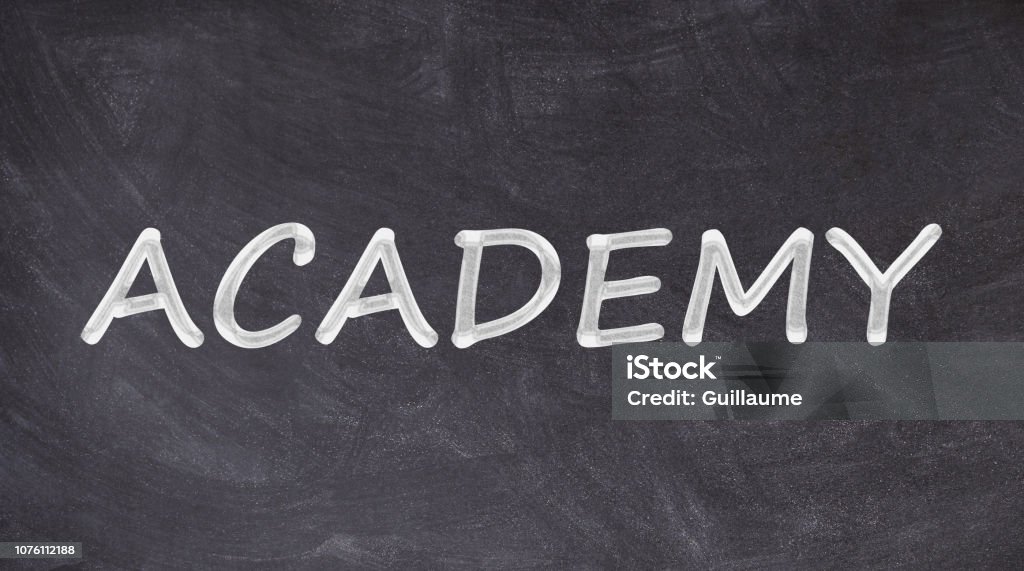 Academy written on blackboard 20-24 Years Stock Photo