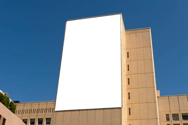 Photo of Large blank billboard on a street wall, banners with room to add your own text