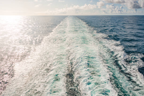 istock Cruise ship track in Atlantic Ocean with direct sunlight, summer time 1076147092