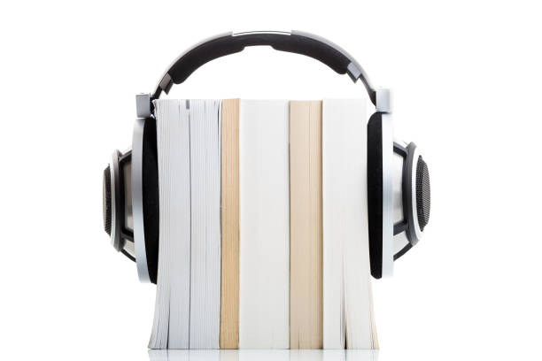 istock Hi-end hifi headphones over multiple books on white 1076155230