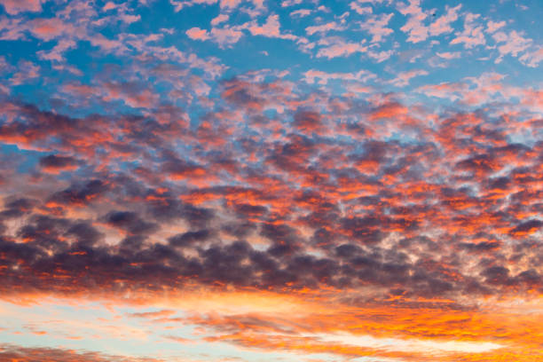 istock Colorful sunset sky over tranquil sea surface 1076157416