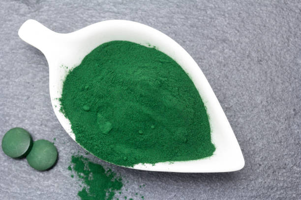 istock Dried spirulina powder 1076158436