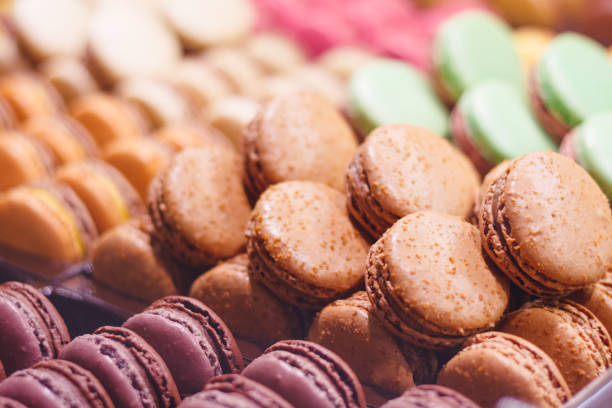 istock Various delicious macarons on a showcase in a French shop. 1076158464