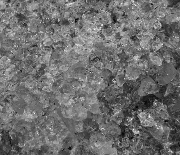 istock pattern of some crushed glass crystals in macro closeup, a black and white texture background 1076173940