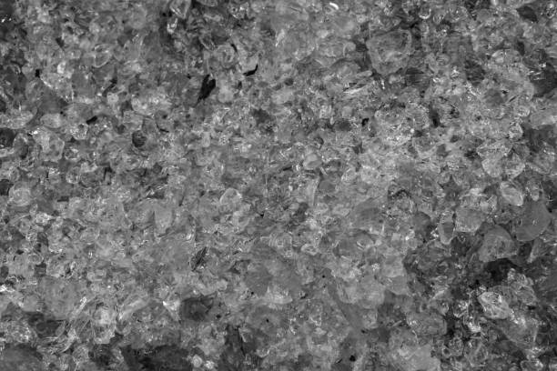 istock pile of crushed glass crystals in macro closeup, black and white texture pattern background 1076173942
