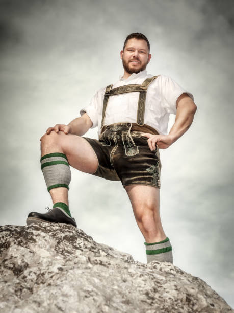 Bavarian tradition A traditional bavarian man in the autumn nature Lederhosen stock pictures, royalty-free photos & images