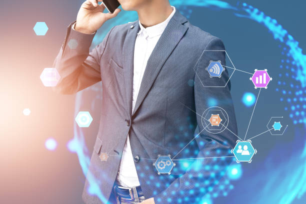 istock Businessman on phone, internet of things 1076181136
