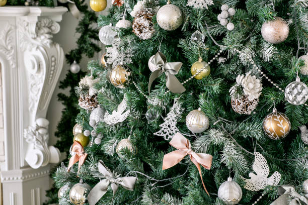 istock Decorated Christmas tree. Classic apartments with a white fireplace. 1076186376