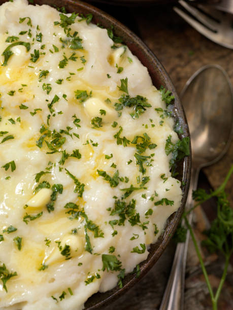 istock Creamy Mashed Potatoes with Butter and fresh Parsley 1076190448