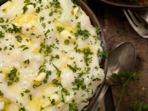 istock Creamy Mashed Potatoes with Butter and fresh Parsley 1076190544