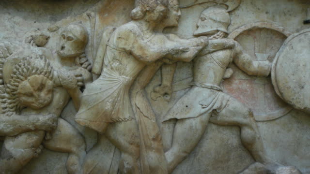 Gigantomachy battle in ancient greek stone frieze