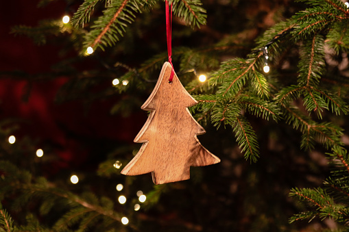 Christmas tree decorated with wooden ornament
