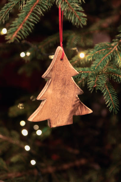 istock Christmas tree decorated with wooden ornament 1076199356